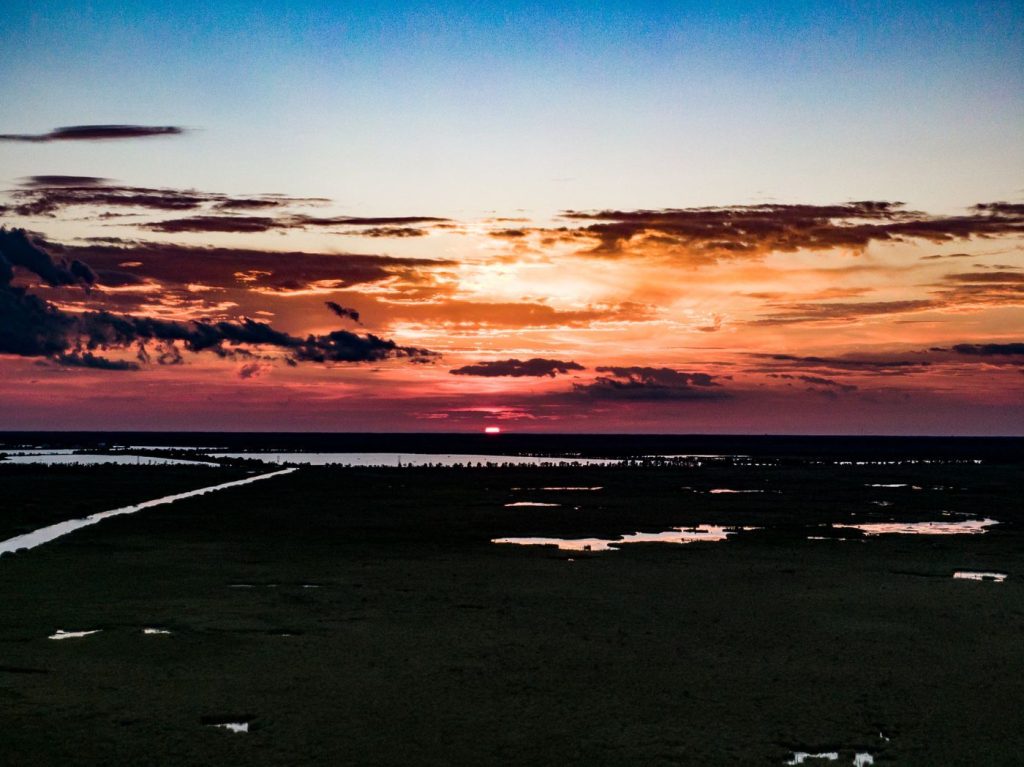 Aerial view of marshland at sunset near Madisonville