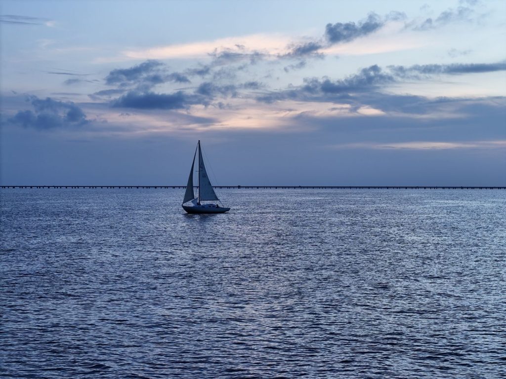 Sailboat on Lake Pontchartrain at sunset